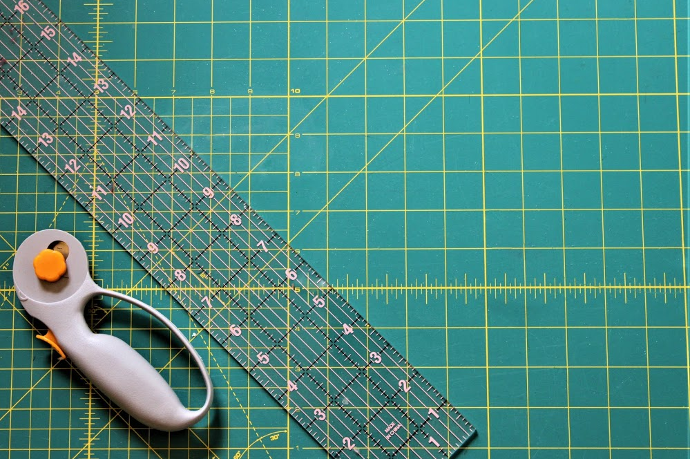 rotary cutter and mat and ruler
